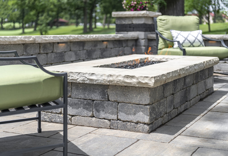 firepit, stone walls and patio